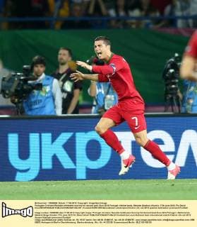 Portugals Cristiano Ronaldo celebrates scoring his second goal..Euro 2012 Portugal v Netherlands, Metalist Stadium, Kharkiv, 17th June 2012. Pic David Klein SPORTIMAGE EDITORIAL USE ONLY. No use with unauthorised audio, video, data, fixture lists, club league logos or live services. Online in-match use limited to 120 images, no video emulation. No use in betting, games or single club league player publications.