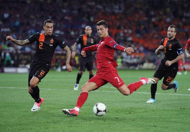 Football - European Championships 2012 - Portugal vs. Netherlands Christiano Ronaldo of Portugal shoots on goal at the Metalist Stadium, Kharkiv 