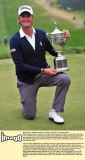 Webb Simpson holds the U.S. Open Trophy after winning the 112th U.S. Open at the Olympic Club in San Francisco, California on June 17, 2012. Simpson finished one-over-par with a four day combined total of 281.  SFP20120617123