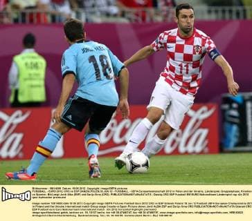 FUSSBALL - EURO 2012, CRO vs ESP DANZIG,POLEN,18.JUN.12 - FUSSBALL - UEFA Europameisterschaft 2012 in Polen und der Ukraine, Länderspiel, Gruppenphase, Kroatien vs Spanien. Bild zeigt Jordi Alba (ESP) und Darijo Srna (CRO). 