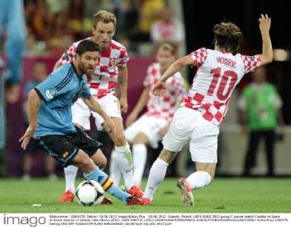18.06.2012. Gdansk, Poland. UEFA EURO 2012 group C soccer match Croatia vs Spain at Arena Gdansk in Gdansk Xabi Alonso (ESP) ,IVAN RAKITIC (CRO) xADAMxJASTRZEBOWSKIx  ActionPlus11292576