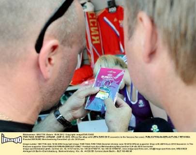 ITAR-TASS: DONETSK, UKRAINE. JUNE 19, 2012. Official fan shop with UEFA EURO 2012 souvenirs in the fanzone (fan zone).  RE10166A