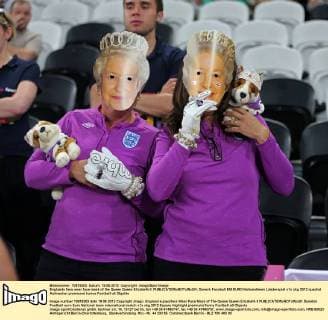 Englands fans wear face mask of the Queen Queen Elizabeth II. EDITORIAL USE ONLY. No use with unauthorised audio, video, data, fixture lists, club league logos or live services. Online in-match use limited to 120 images, no video emulation. No use in betting, games or single club league player publications.