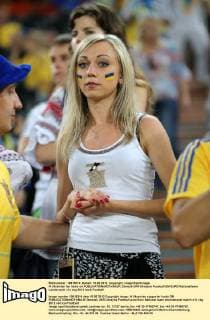 A Ukrainian fan looks on EDITORIAL USE ONLY. No use with unauthorised audio, video, data, fixture lists, club league logos or live services. Online in-match use limited to 120 images, no video emulation. No use in betting, games or single club league player publications.