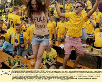 A protest action from the FEMEN women s movement in the UEFA EURO 2012 fan zoneon June 19, 2012 in Kyiv, Ukraine. 