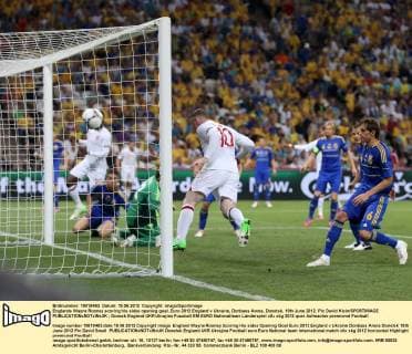 Englands Wayne Rooney scoring his sides opening goal..Euro 2012 England v Ukraine, Donbass Arena, Donetsk, 19th June 2012. Pic David Klein SPORTIMAGE EDITORIAL USE ONLY. No use with unauthorised audio, video, data, fixture lists, club league logos or live services. Online in-match use limited to 120 images, no video emulation. No use in betting, games or single club league player publications.