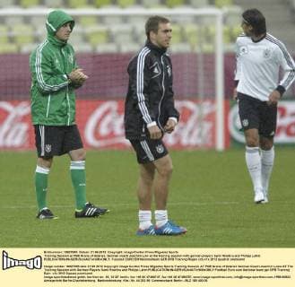 Training Session at PGE Arena of Gdansk. German coach Joachim Löw at the training session with german players Sami Khedira and Philipp Lahm. 