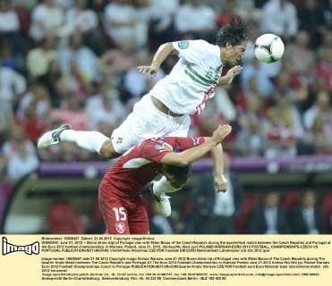 WARSAW, June 21, 2012 -- Bruno Alves (Up) of Portugal vies with Milan Baros of the Czech Republic during the quarterfinal match between the Czech Republic and Portugal at the Euro 2012 football championships in Warsaw, Poland, June 21, 2012. (Xinhua Wu Wei) (jyc) POLAND-WARSAW-EURO 2012 FOOTBALL CHAMPIONSHIPS-CZECH VS PORTUGAL 