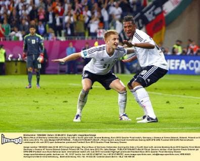 Marco Reus of Germany celebrates scoring his side s fourth goal with Jerome Boateng..Euro 2012 Quarter Final match, Germany v Greece at Arena Gdansk, Gdansk, Poland on the 22nd June 2012. Pic Jake Badger SPORTIMAGE... EDITORIAL USE ONLY. No use with unauthorised audio, video, data, fixture lists, club league logos or live services. Online in-match use limited to 120 images, no video emulation. No use in betting, games or single club league player publications.