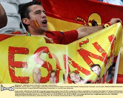 DONETSK, June 23, 2012 -- A fan for Spain reacts before the quarterfinal match at the Euro 2012 football championships in Donetsk, June 23, 2012. 
