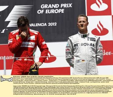 Motorsports: FIA Formula One World Championship 2012, Grand Prix of Europe, 5 Fernando Alonso (ESP, Scuderia Ferrari), 7 Michael Schumacher (GER, Mercedes AMG Petronas F1 Team), xHOCHxZWEIx