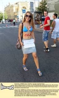 A Girl in a Bikini wants to sell a ticket - Euro 2012 England V Italy, Olympic Stadium, Kiev, 24th June 2012. EDITORIAL USE ONLY. No use with unauthorised audio, video, data, fixture lists, club league logos or live services. Online in-match use limited to 120 images, no video emulation. No use in betting, games or single club league player publications.