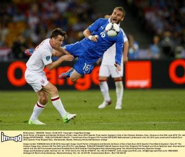 Scott Parker of England and Daniele De Rossi of Italy clash..Euro 2012 Quarter Final match, England v Italy at the Olympic Stadium, Kiev, Ukraine on the 24th June 2012. Pic Jake Badger SPORTIMAGE... EDITORIAL USE ONLY. No use with unauthorised audio, video, data, fixture lists, club league logos or live services. Online in-match use limited to 120 images, no video emulation. No use in betting, games or single club league player publications.
