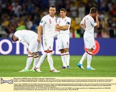 Football - European Championships 2012 - England vs. Italy John Terry and Steven Gerrard of England are left looking dejected following defeat on penalties at the Olympic Stadium, Kiev 