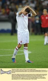 Football - European Championships - England vs. Italy England s Steven Gerrard looks dejected as his team lose on penalties at the Olympic Stadium, Kiev, Ukraine 