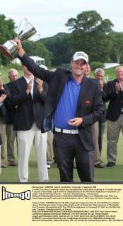 24 JUN 2012: Marc Leishman raises the championship trophy after finishing at -14 under par after 4 rounds of the FedEx Cup Travelers Championship at the TPC River Highlands in Cromwell, CT. GOLF: JUN 24 PGA Golf Herren - Travelers Championship - Final Round Icon120624020 EDITORIAL USE ONLY