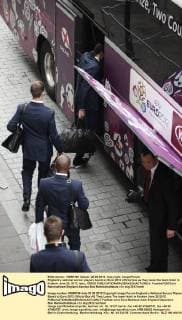 England s national soccer players board an Euro 2012 official bus as they leave the team hotel in Krakow June 25, 2012. lemi_120625 