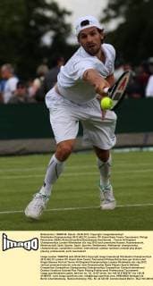 Wimbledon Championships 2012 AELTC,London, ITF Grand Slam Tennis Tournament, Philipp Petzschner (GER); Aktion,Einzelbild,Ganzkoerper,Hochformat,