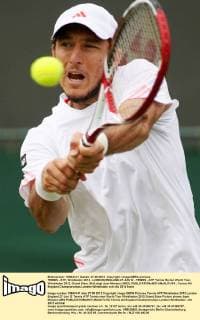 TENNIS - ATP, Wimbledon 2012 - LONDON,ENGLAND,27.JUN.12 - TENNIS - ATP Tennis Herren World Tour, Wimbledon 2012, Grand Slam. Bild zeigt Juan Monaco (ARG). 