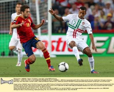 FUSSBALL - EURO 2012, POR vs ESP DONETSK,UKRAINE,27.JUN.12 - FUSSBALL - UEFA Europameisterschaft 2012 in Polen und der Ukraine, Halbfinale, Portugal vs Spanien. Bild zeigt Jordi Alba (ESP) und Nani (POR). 
