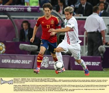 FUSSBALL - EURO 2012, POR vs ESP DONETSK,UKRAINE,27.JUN.12 - FUSSBALL - UEFA Europameisterschaft 2012 in Polen und der Ukraine, Halbfinale, Portugal vs Spanien. Bild zeigt David Silva (ESP) und Fabio Coentrao (POR). 