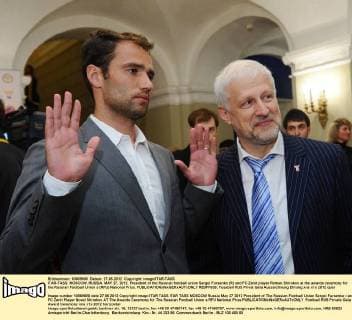 ITAR-TASS: MOSCOW, RUSSIA. MAY 27, 2012. President of the Russian football union Sergei Fursenko (R) and FC Zenit player Roman Shirokov at the awards ceremony for the Russian Football Union s (RFU) National Prize.  RE0FF639