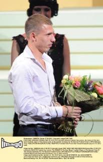 ITAR-TASS: MOSCOW, RUSSIA. MAY 27, 2012. FC Lokomotiv Moscow captain Ilya Leonov, the winner of the best beach football player of the season prize, at the awards ceremony for the Russian Football Union s (RFU) National Prize.  RE0FF670
