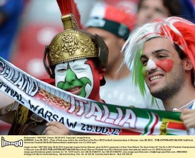 WARSAW, June 28, 2012 -- Fans of Italy pose before the semifinal at the Euro 2012 football championships in Warsaw, June 28, 2012. - 
