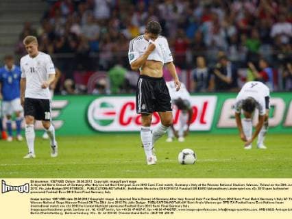 A dejected Mario Gomez of Germany after Italy scored their first goal..Euro 2012 Semi Final match, Germany v Italy at the Warsaw National Stadium, Warsaw, Poland on the 28th June 2012. Pic Jake Badger SPORTIMAGE... EDITORIAL USE ONLY. No use with unauthorised audio, video, data, fixture lists, club league logos or live services. Online in-match use limited to 120 images, no video emulation. No use in betting, games or single club league player publications.