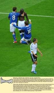 The Euro 2012 football championships semi-final match Germany vs. Italy on June 28, 2012 at the National Arena in Warsaw, Poland. Claudio Marchisio, Daniele De Rossi and Mario Balotelli celebrate the goal - here with Philipp Lahm (front)  EN_01035922_0084