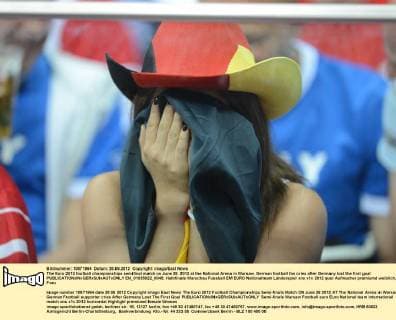 The Euro 2012 football championships semifinal match on June 28, 2012 at the National Arena in Warsaw. German football fan cries after Germany lost the first goal  EN_01035922_0045
