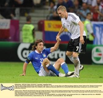 The Euro 2012 football championships semi-final match Germany vs. Italy on June 28, 2012 at the National Arena in Warsaw, Poland. Andrea Pirlo, Bastian Schweinsteiger  EN_01035922_0155