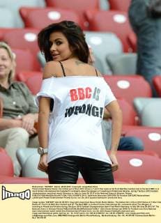 Polish model Natalia Siwiec, the hottest girl of Euro 2012 shows a T-shirt that reads at the front Bad Boy Cambell and at the back BBC is to mock former international Sol Campbell’s comments about the dangers of travelling to Poland and Ukraine, during The Euro 2012 football championships semi-final match Germany vs. Italy on June 28, 2012 at the National Arena in Warsaw, Poland.  EN_01035975_0011
