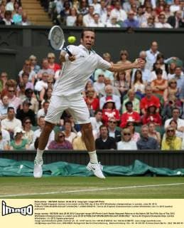 Czech Radek Stepanek returns in his match on the fifth day of the 2012 Wimbledon championships in London, June 29, 2012.  LON2012062915