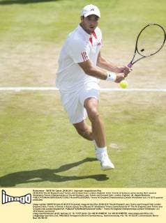 29.06.2012 The All England Lawn Tennis and Croquet Club. London, England. Viktor Troicki of Serbia in action during third round at Wimbledon Tennis Championships at The All England Lawn Tennis and Croquet Club. London, England, UK xNigelxWaldronx  ActionPlus20252553