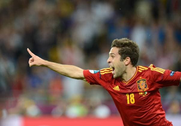 Jordi Alba of Spain celebrates after scoring a goal against Italy in the final match of the UEFA European Football Championship 2012 in Kiev, Ukraine, 1 July 2012. Majestic Spain took their place among the games greats by thrashing Italy 4-0 to retain their European title on Sunday (1 July 2012), the biggest victory margin in a World Cup or Euro final, and all without a recognized striker. Their success rewrote the tactical handbook and the record books after goals from David Silva, Jordi Alba and late substitutes Fernando Torres and Juan Mata gave the world champions an ultimately easy victory over an Italian team down to 10 men through injury for the last half-hour. Spain routs Italy 4-0 to win Euro 2012 crown  pau671347_03