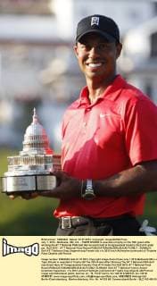 July 1, 2012 - Bethesda, MD, U.S. - TIGER WOODS is awarded a trophy on the 18th green after winning the AT T National PGA Golf Herren event held at Congressional Country Club at 8 under par. Golf 2012 - AT T National Final Round - ZUMAb21