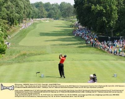 JULY 01, 2012 - Tiger Woods tees off at the eleventh hole during final round play at the AT&T National at Congressional Country Club in Bethesda MD. Golf 2012: AT&T National JUL 01 - ZUMAcjm