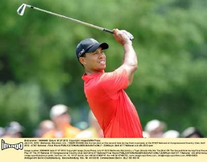 JULY 01, 2012 - Bethesda, Maryland, U.S. - TIGER WOODS hits his tee shot on the second hole during final round play at the AT&T National at Congressional Country Club. Golf 2012 - AT&T National - Final Round - ZUMAcjm