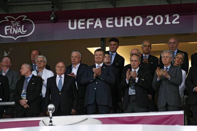Ukrainian Speaker Volodymyr Lytvyn (2nd L, 2nd row), Ukrainian PM Mykola Azarov (3rd L, 2nd row), FFU President Hryhoriy Surkis, FIFA President Joseph Blatter, Ukraine s President Viktor Yanukovych, FIGC Giancarlo Abete and Italian Prime Minister Mario Monti (L to R, front row) attend the UEFA EURO 2012 final match between Spain and Italy at the NSC Olimpiyskiy in Kyiv, capital of Ukraine, on July 1, 2012. -