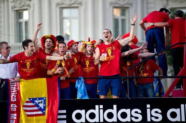Juanfran, Cesc Fabregas, Santi Cazorla, Andres Iniesta, Jordi Alba and Alvaro Negredo (L-R) - Spanish national football team have bathed in the crowd that was waiting for them to go through Madrid s streets on an open bus to celebrate their winning EURO 2012. RobertoxMariscal 