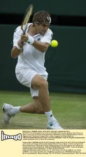03.07.2012. The All England Lawn Tennis and Croquet Club. London, England. David Ferrer of Spain in action during fourth round qualifying at Wimbledon Tennis Championships at The All England Lawn Tennis and Croquet Club. London, England, UK xNigelxWaldronx  ActionPlus20253866