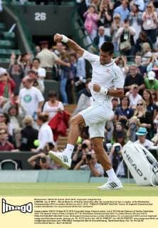 LONDON, July 4, 2012 -- Novak Djokovic of Serbia celebrates after the quarterfinal of men s singles at the Wimbledon Championships 2012 in London, Britain on July 4, 2012. 
