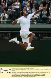 Jo-Wilfried Tsonga of France celebrates after the quarterfinal of men s singles at the Wimbledon Championships 2012 in London - 