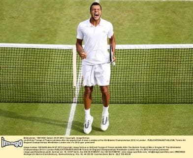 Jo-Wilfried Tsonga of France jubilates after the quarterfinal of men s singles at the Wimbledon Championships 2012 in London - 