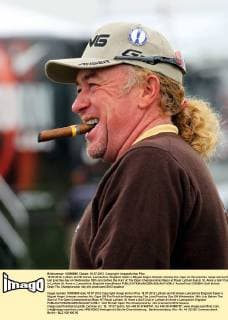 18.07.2012. Lytham and St Annes, Lancashire, England. Spain s Miguel Angel Jimenez smokes his cigar on the practise range during the last practise day on Wednesday 18th July before the start of The Open Championship Major at Royal Lytham &amp; St. Anne s Golf Club in Lytham St. Anne s, Lancashire, England xIanxBinesx  ActionPlus11303504
