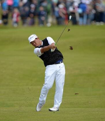 Japan s Koumei Oda hits a fairway shot on the 6th hole on the second round of The 2012 Open Championship in Lytham St Annes, July 20, 2012.  LON2012072009