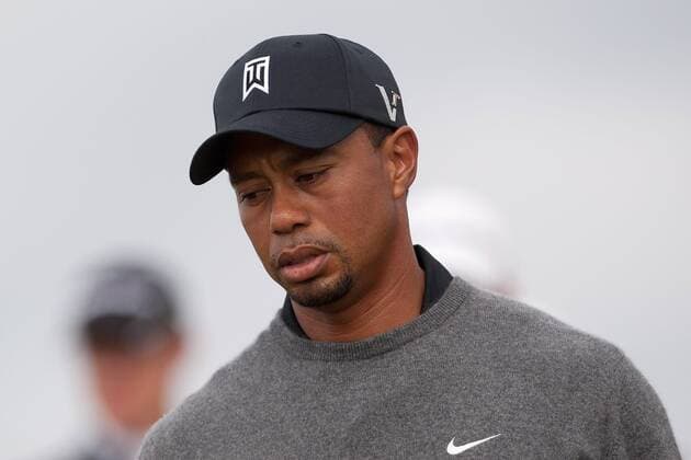 Golf - The Open - Day Two Tiger Woods of USA looks dejected following a strayed shot off the 11th tee at Royal Lytham & St Anne s Golf Club 
