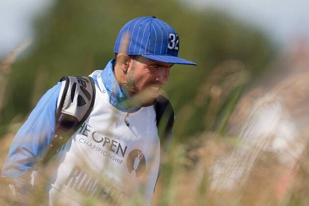Golf - The Open - Day Four Carlos Tevez of Manchester City acts as caddie for Andres Romero of Argentina at Royal Lytham & St Anne s Golf Club 