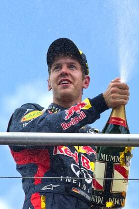 Sebastian VETTEL (GER), Red Bull Racing, 2. Platz, feiert mit Champagner; Querformat; Triumph; Rennen am 22.07.2012; Halbfigur, Hochformat; Motorsport Formel 1, Grosser Preis Santander von Deutschland am Hockenheimring, vom 19.07.-22.07.2012